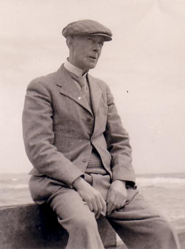 Francis Bergh seated near the seaside