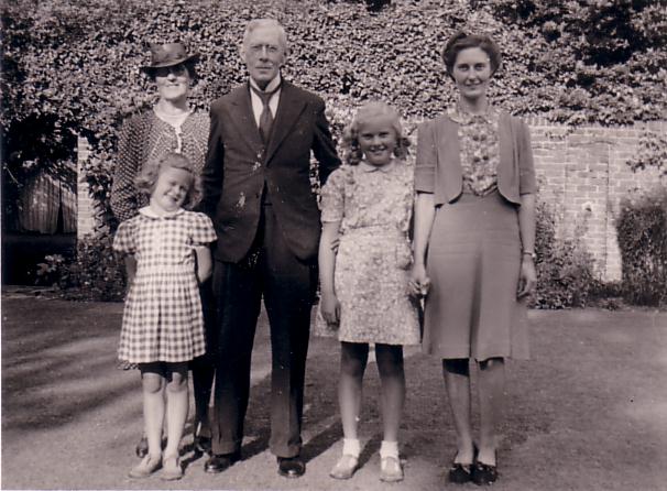 Francis Bergh and group standing on lawn