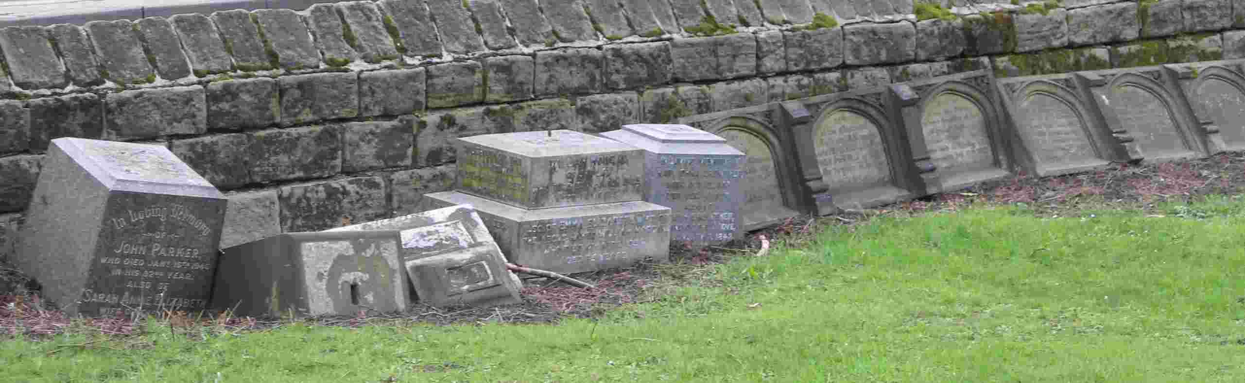 Many tombstones have been laid against the walls of the grounds of St Paul's Church, 
                                            Shipley, Diocese of Bradford